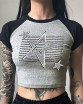 Rigel – Kurzes Raglan-Oberteil „Star Burn“